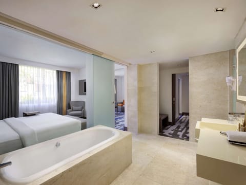 Suite, 1 Double Bed with Sofa bed | Bathroom | Rainfall showerhead, eco-friendly toiletries, hair dryer, slippers