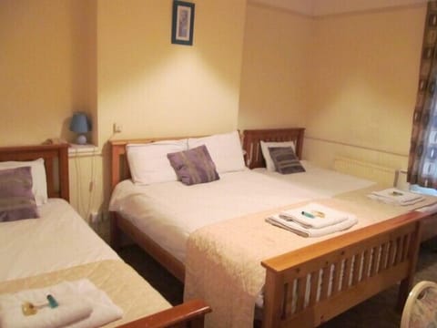 Family Room | Desk, blackout drapes, iron/ironing board, free WiFi