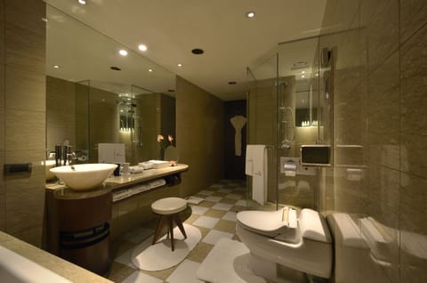 Suite, 1 King Bed, Non Smoking | Bathroom | Separate tub and shower, rainfall showerhead, designer toiletries