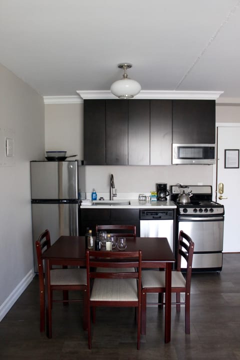 Luxury Suite, 2 Bedrooms, Kitchenette | Private kitchen | Mini-fridge, coffee/tea maker, freezer
