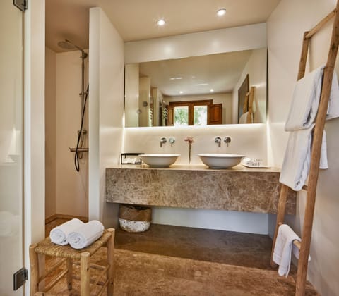 Suite (Masia) | Bathroom | Designer toiletries, hair dryer, bathrobes, slippers