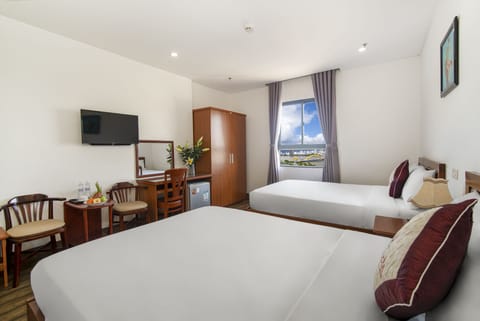 Superior Quadruple Room, City View | Premium bedding, minibar, individually decorated, desk