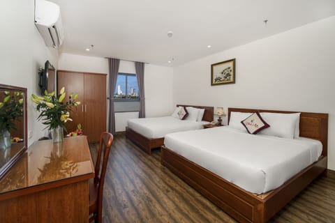 Panoramic Triple Room, City View | Premium bedding, minibar, individually decorated, desk