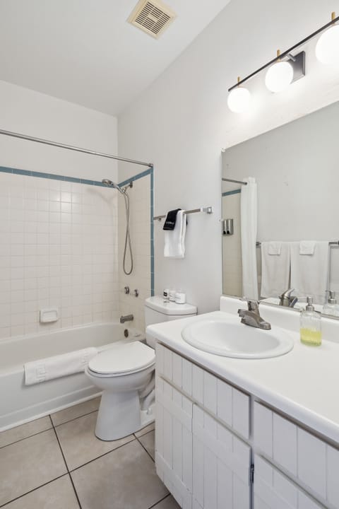 Suite 302 | Bathroom | Hair dryer, towels, soap, shampoo