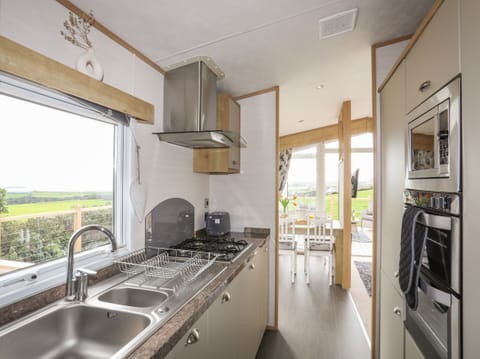 Fridge, electric kettle, toaster, cookware/dishes/utensils