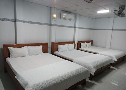 Shared Dormitory, Non Smoking, Private Bathroom | Minibar, in-room safe, desk, blackout drapes