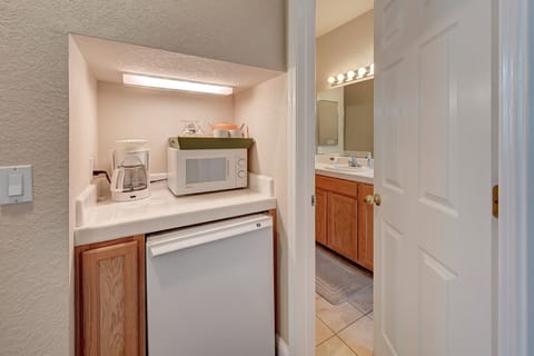 Minifridge and coffee maker in the suite bedroom.
