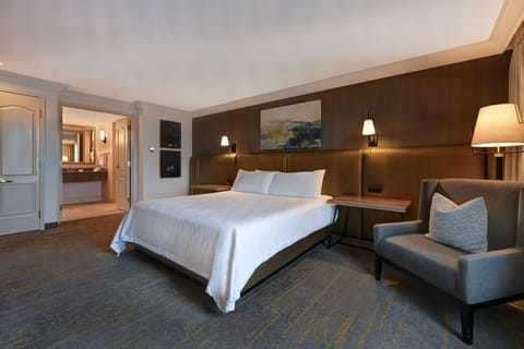 Suite, 1 King Bed, Jetted Tub | In-room safe, desk, iron/ironing board, rollaway beds