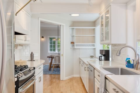 Fully equipped kitchen adorned with sleek appliances.