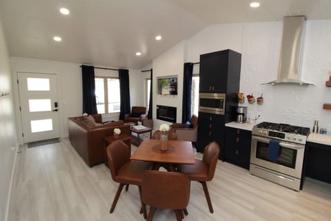 Executive Cabin | Private kitchen | Full-size fridge, microwave, oven, stovetop