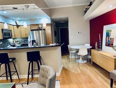 Seating for 2 at the bar, seating for 4 at the table. (4th chair not shown.) 