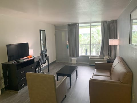 Suite, Multiple Beds, Non Smoking | Living area | TV