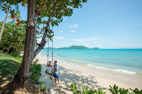 Private beach, white sand, sun loungers, beach umbrellas