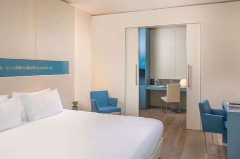 Premium bedding, down comforters, minibar, in-room safe