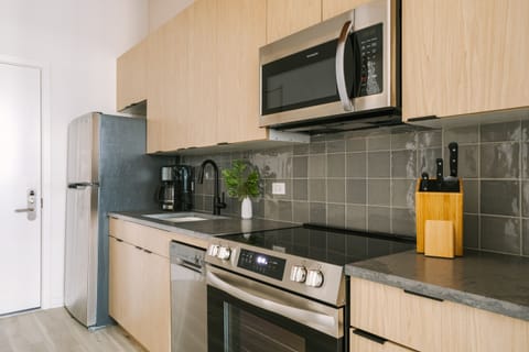 Superior Studio | Private kitchen | Full-size fridge, oven, stovetop, dishwasher