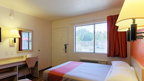 Deluxe Room, 1 Queen Bed, Non Smoking, Refrigerator & Microwave | Free WiFi, bed sheets