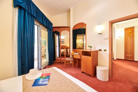 Family Room with Balcony - Sea Side | Minibar, in-room safe, travel crib, free WiFi