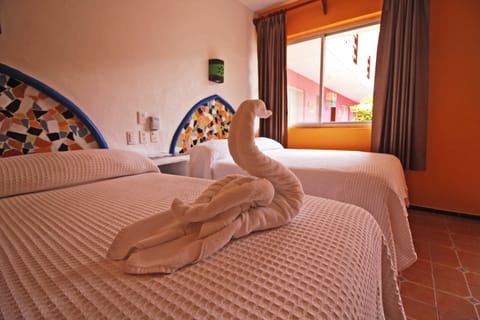 Traditional Double Room, Private Bathroom | Down comforters, in-room safe, blackout drapes, iron/ironing board