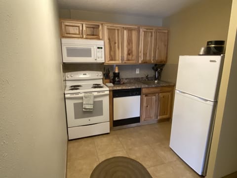 Family Apartment, 1 Bedroom | Private kitchen | Fridge, microwave, coffee/tea maker