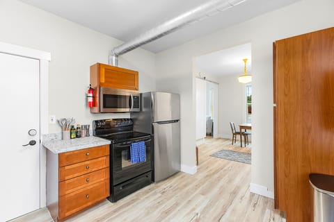 Classic Apartment | Private kitchen | Fridge, microwave, oven, stovetop