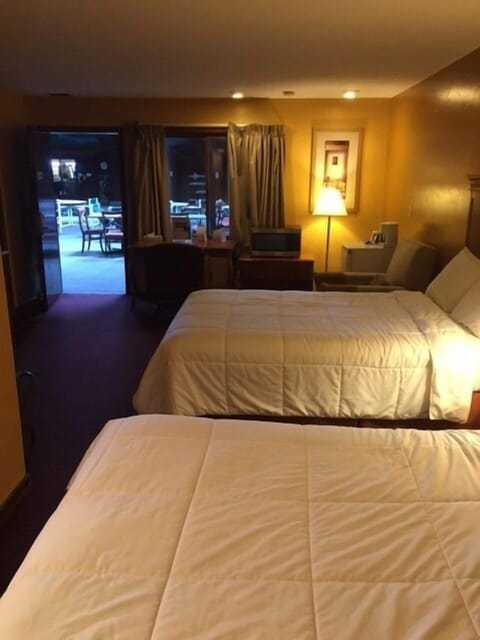 Standard Room, 2 Queen Beds, Non Smoking, Poolside | Desk, blackout drapes, iron/ironing board, rollaway beds