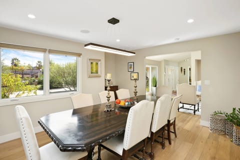 The dining room has a view of the front yard and driveway