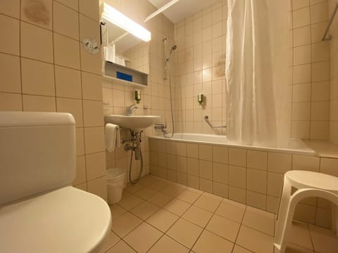 Classic Triple Room, 1 Bedroom | Bathroom | Hair dryer, towels