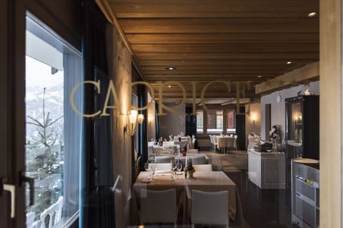 Breakfast, lunch, dinner served; Italian cuisine, garden views 