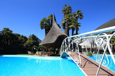 Seasonal outdoor pool, pool umbrellas, sun loungers