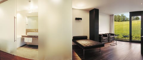 Suite, Balcony (Sensual Romance) | Living area | TV, fireplace