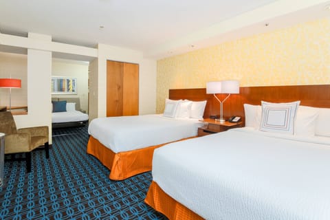 Suite, 2 Double Beds | In-room safe, desk, laptop workspace, blackout drapes