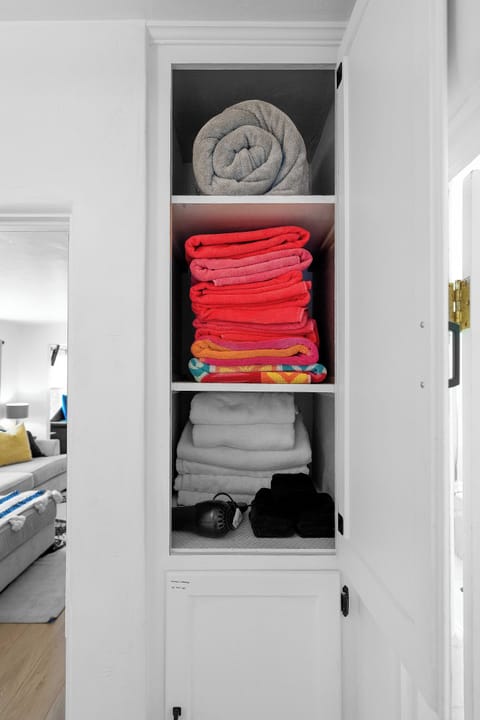 Hallway linen closet, blowdryer, beach towels, extra towels, extra blanket. 