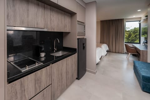 Superior Suite, Kitchenette | Minibar, in-room safe, desk, laptop workspace