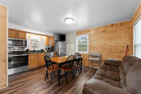 Where gourmet meals meet modern elegance a kitchen and dining space designed for both cooking and sharing memories