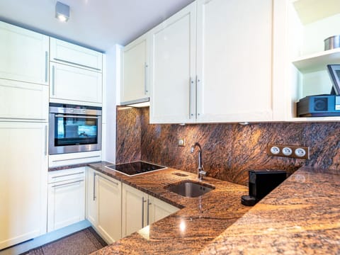 Cabinetry, Countertop, Property, Kitchen Stove, Sink, Wood, Kitchen, Tap, Kitchen Appliance, Interior Design