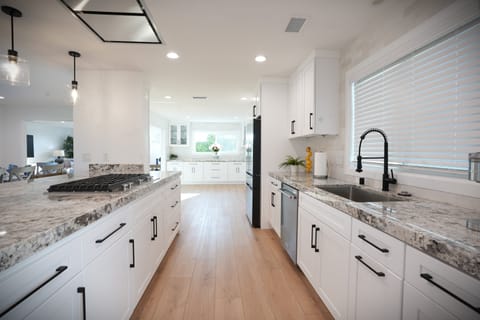 Kitchen has Granite Countertops and Stainless Steel Appliances