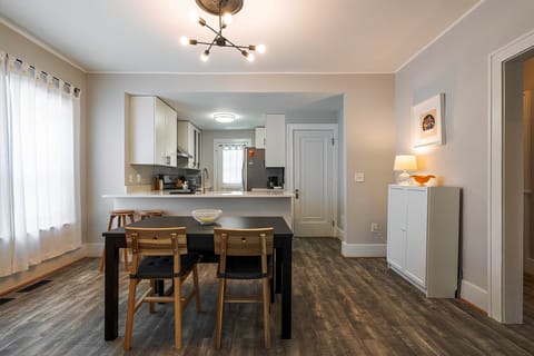 The dining area and kitchen are seamless, making it easy to stay connected.