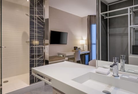 Standard Room, City View | Bathroom | Rainfall showerhead, hair dryer, towels, soap