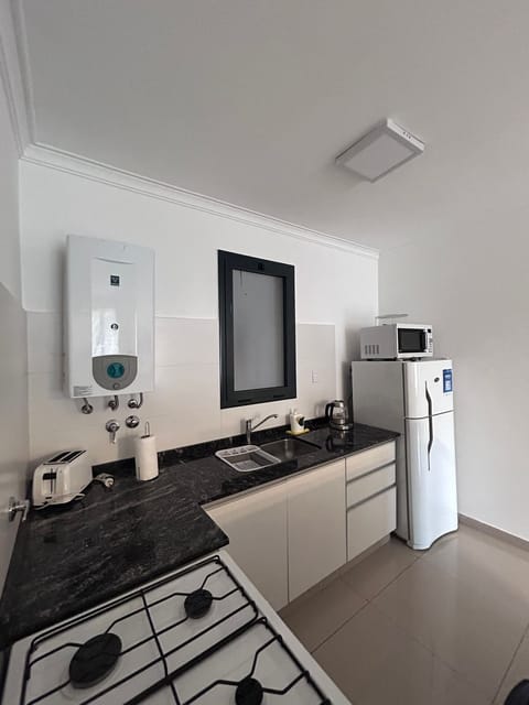 Grand Duplex | Private kitchen | Full-size fridge, microwave, oven, stovetop