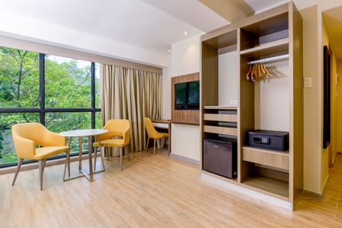 Family Room, 2 Queen Beds, Non Smoking | Minibar, in-room safe, individually furnished, desk