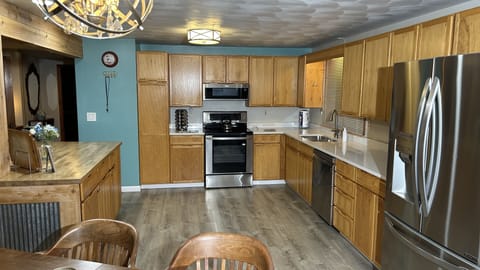 Glass Top Elec. Range Convection Oven, garbage disposal, dishwasher, microwave.