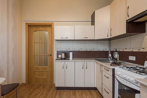 Apartment | Private kitchen | Fridge, electric kettle, cookware/dishes/utensils, cleaning supplies