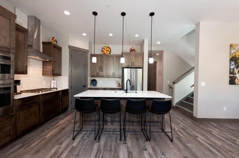 Full stocked kitchen - seating for 4 at the bar