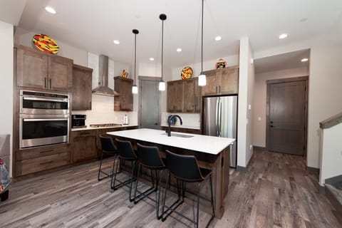 Full stocked kitchen - seating for 4 at the bar