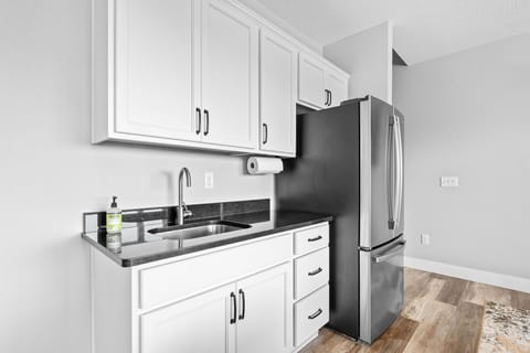 No need to head upstairs—grab a cold drink or late-night snack from the fridge and wet bar downstairs.