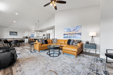 Together time is easy here—everyone can lounge, cook, and dine in one beautifully connected space.