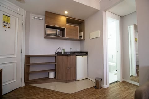 Apartment | Private kitchen | Mini-fridge, cookware/dishes/utensils