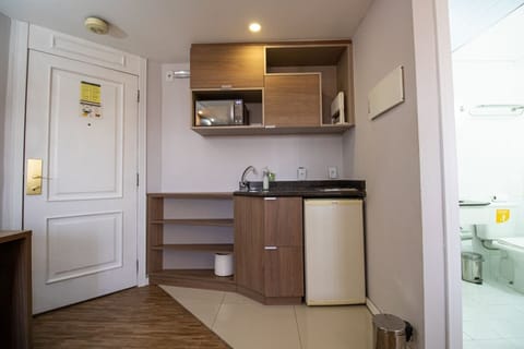 Apartment | Private kitchen | Mini-fridge, cookware/dishes/utensils