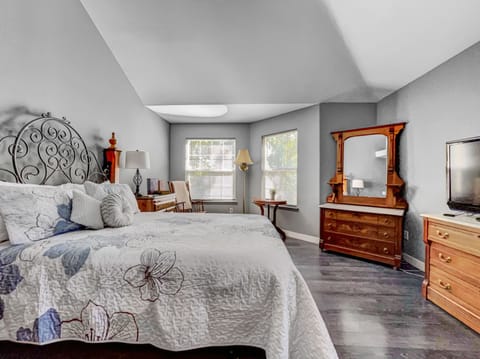 Master bedroom is equipped with a comfy queen bed and space for privacy.