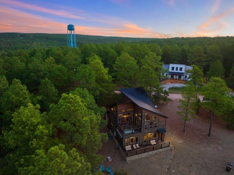 Cabin is located on over an acre lot on the corner of a cul-de-sac.